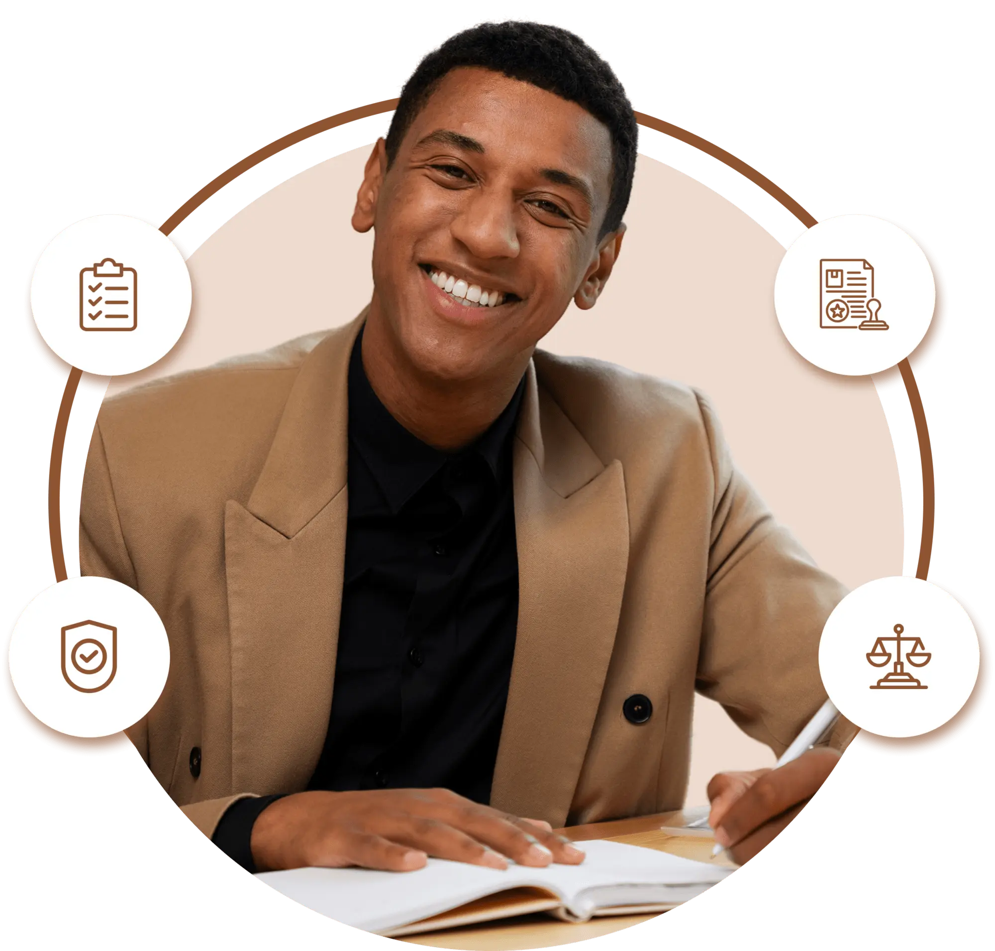 A man in a suit smiles while seated at a desk, with a pen in hand and paper in front of him, suggesting productivity